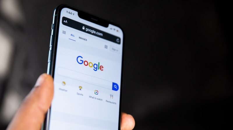 person holding black android smartphone - Photo by Solen Feyissa on Unsplash